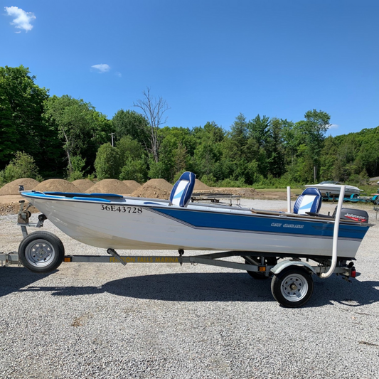 fishing boat hooked up to a trailer blue skies